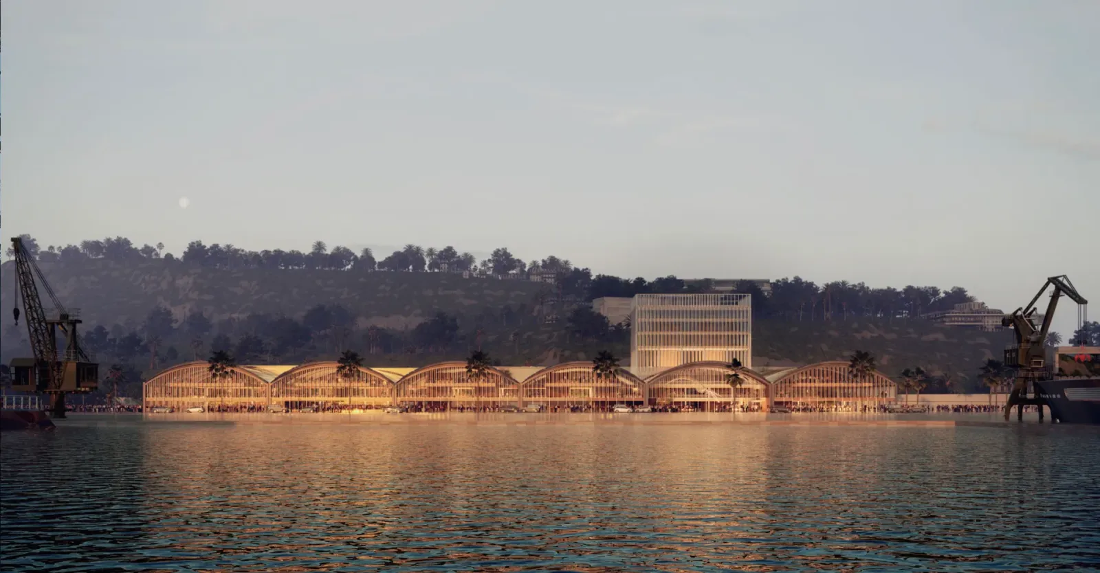 Render of the future BlueTechPort headquarters viewed from the water, with a row of vaulted-roof buildings with glazed façades, a glazed tower behind and harbour cranes on either side at dusk.